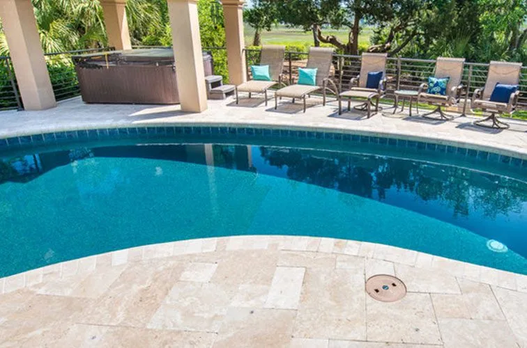 Ivory travertine french pattern pool